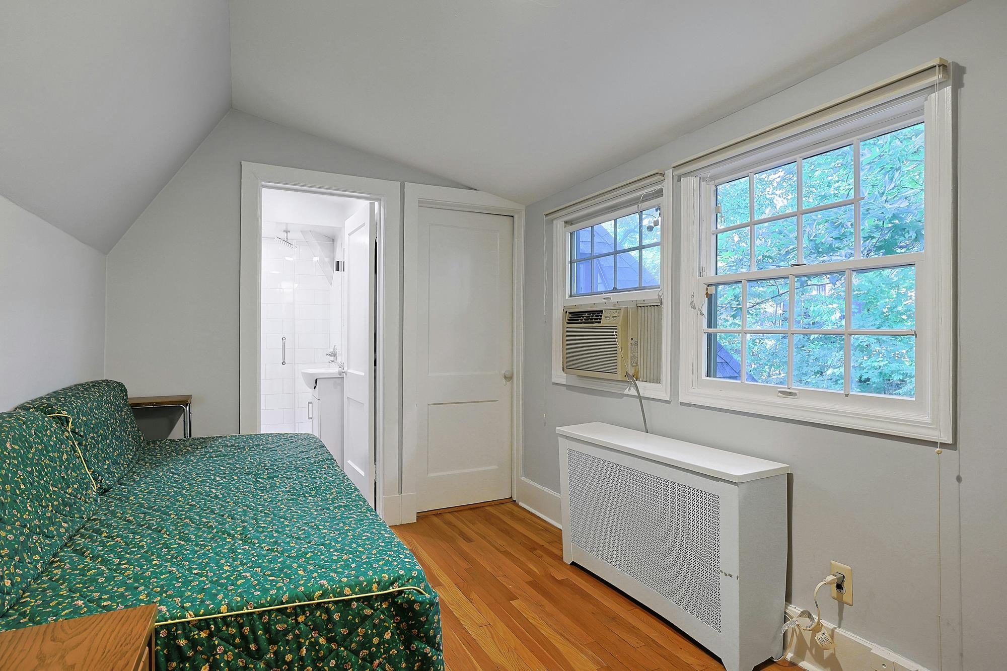 Classic & Spacious 5-Bd. Center-Hall Medieval Revival-Style House with Patio & Grassy Yard
