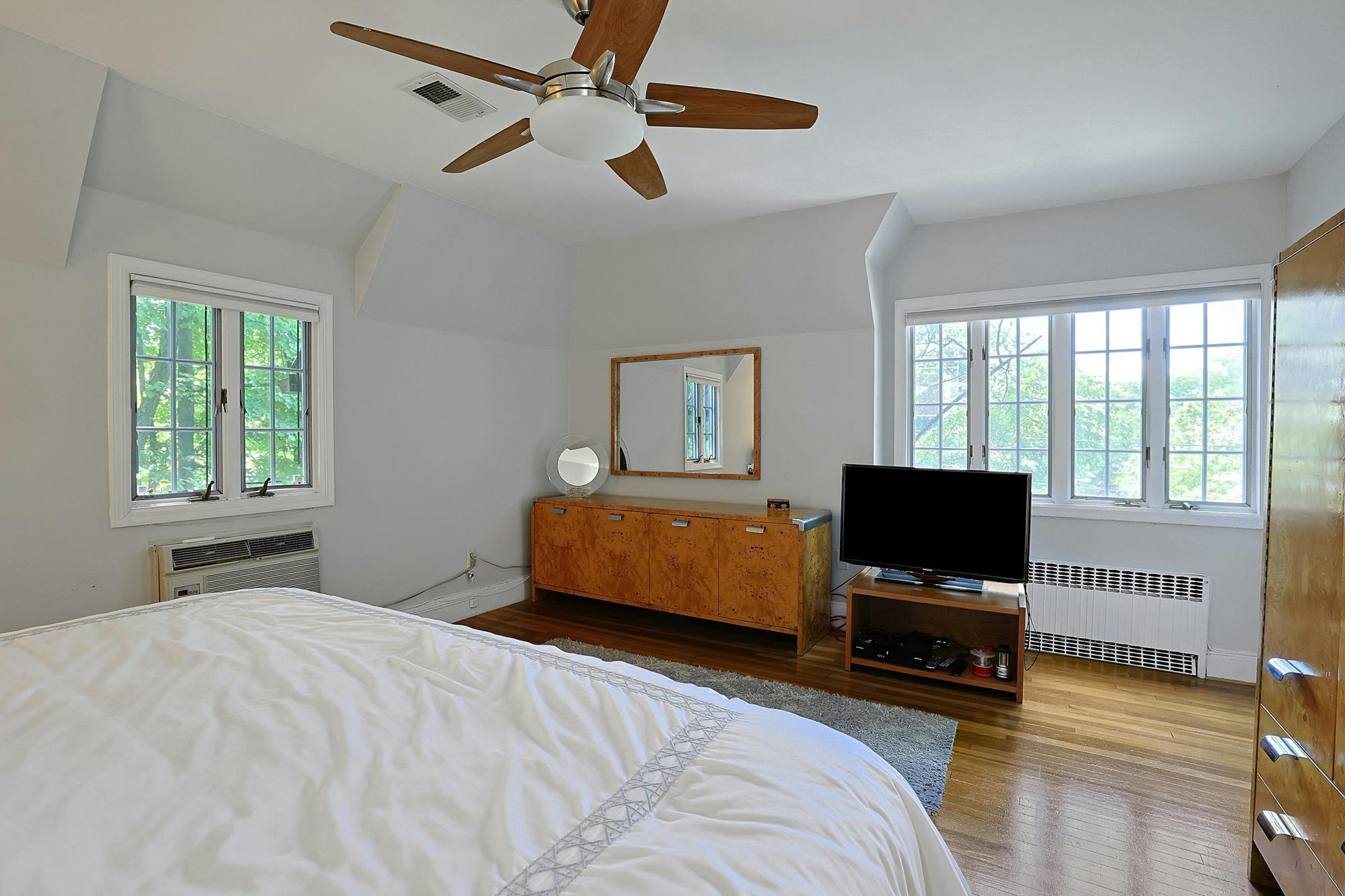Classic & Spacious 5-Bd. Center-Hall Medieval Revival-Style House with Patio & Grassy Yard
