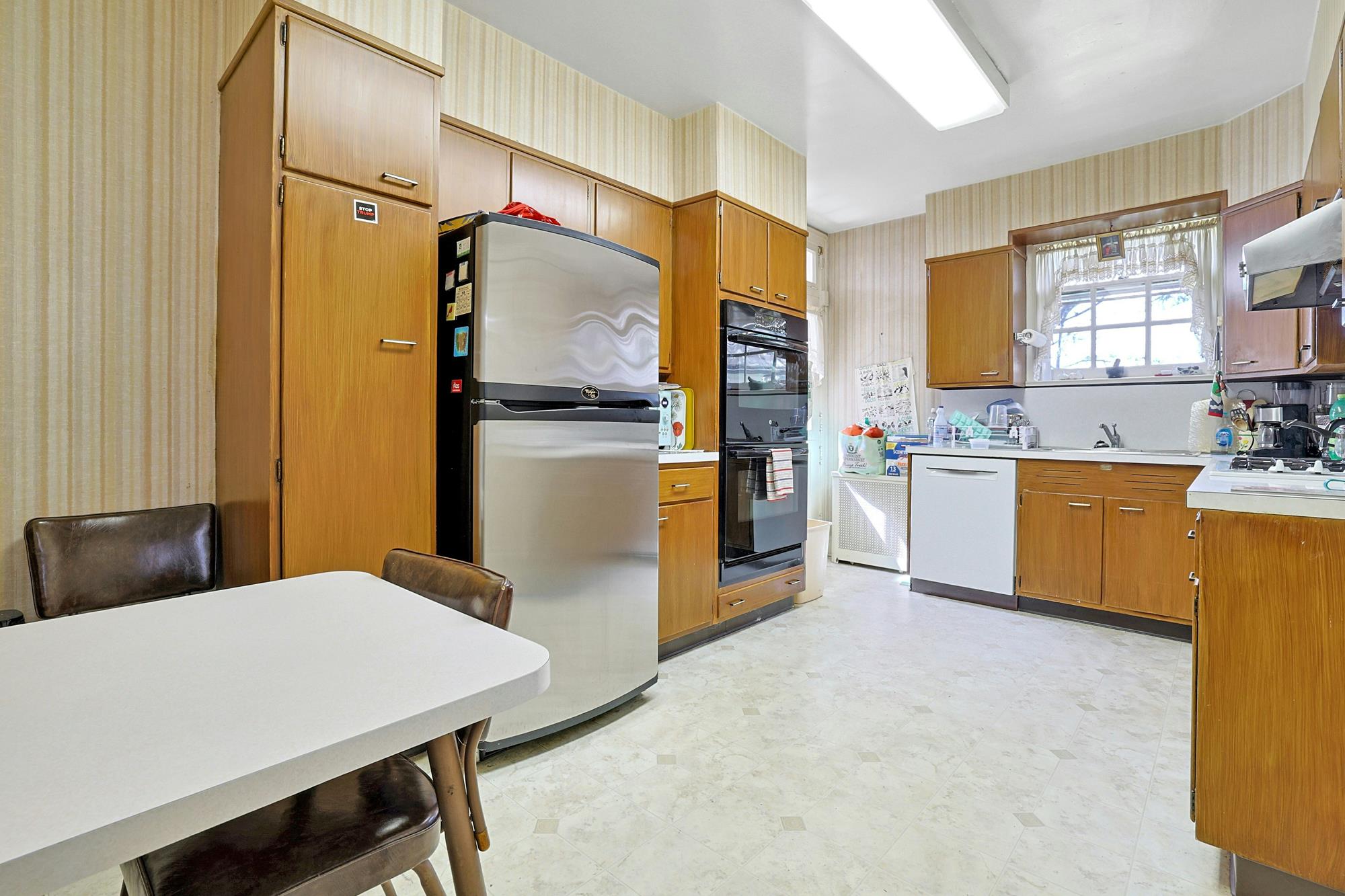 Classic & Spacious 4-Bd. Brick Center-Hall Colonial with Porch & Grassy Yards