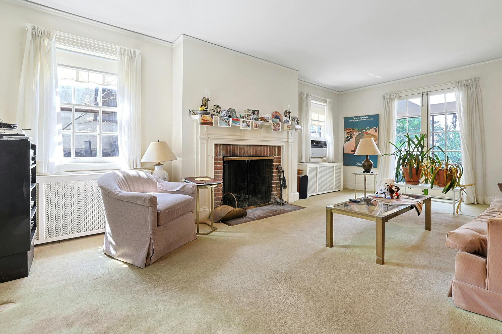 Classic & Spacious 4-Bd. Brick Center-Hall Colonial with Porch & Grassy Yards