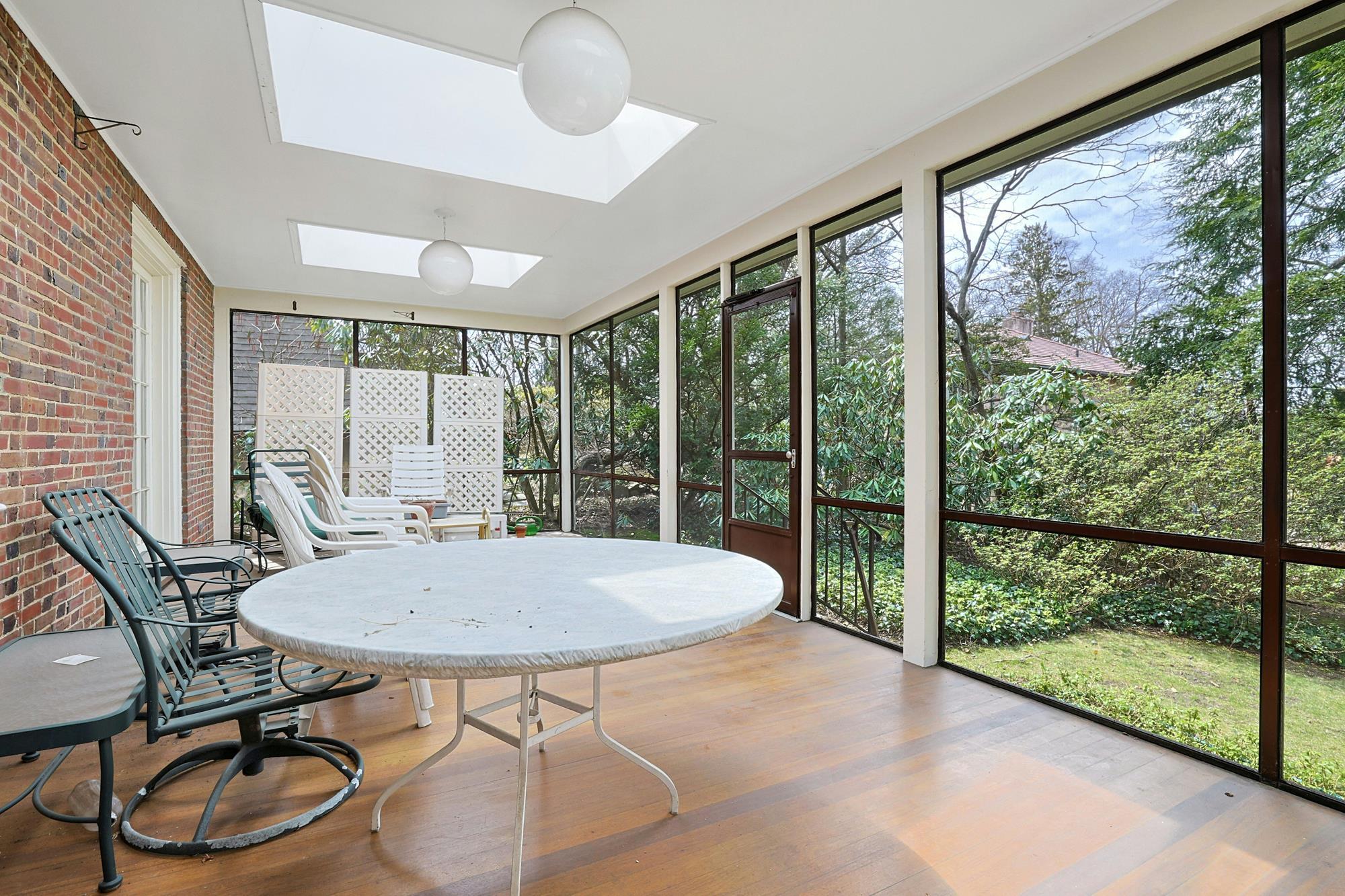 Classic & Spacious 4-Bd. Brick Center-Hall Colonial with Porch & Grassy Yards