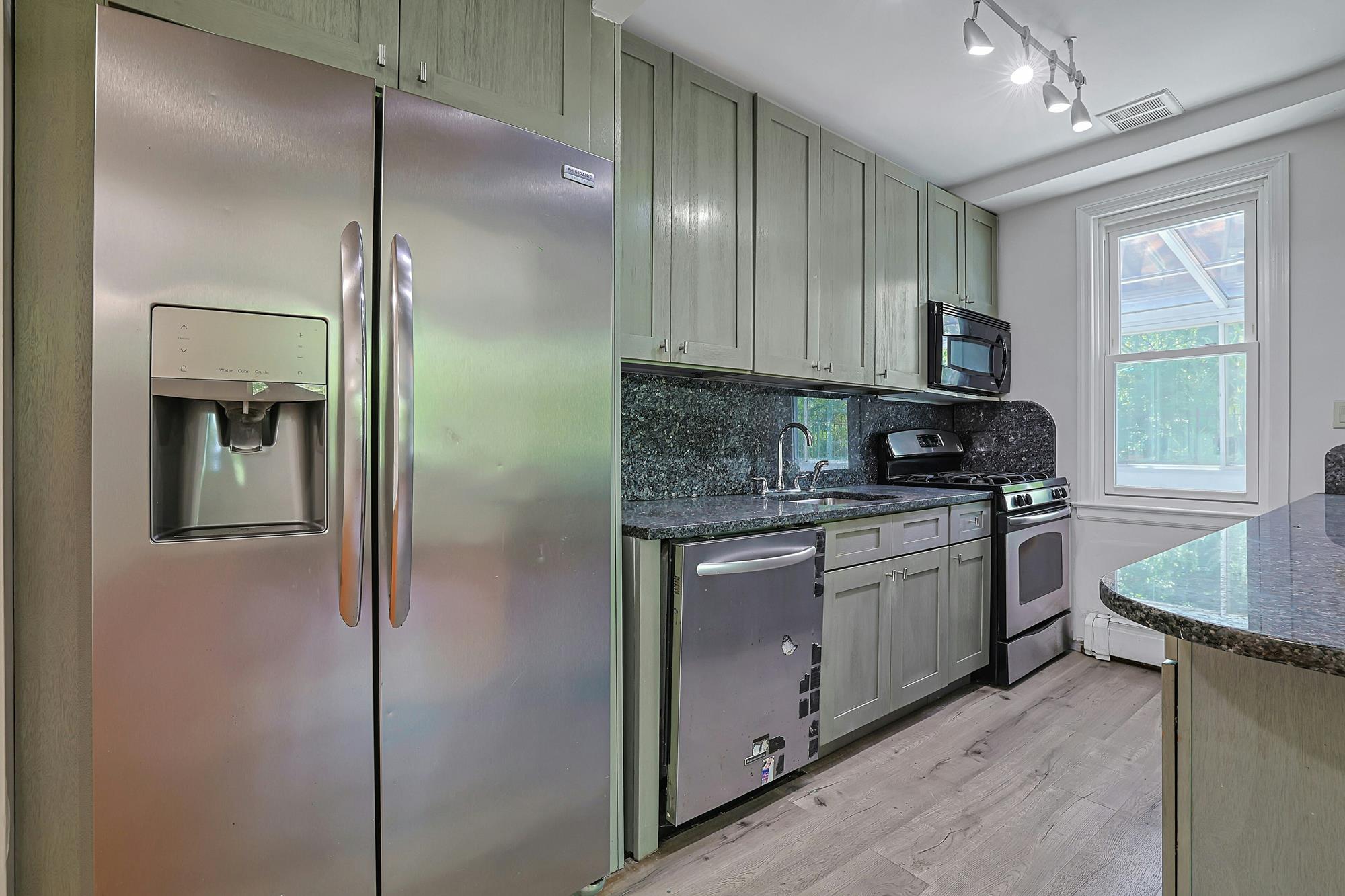 Spacious 4-Bd. Double Apartment with Glass Solarium & Large Private Roof Terrace + In-Unit Laundry Closet