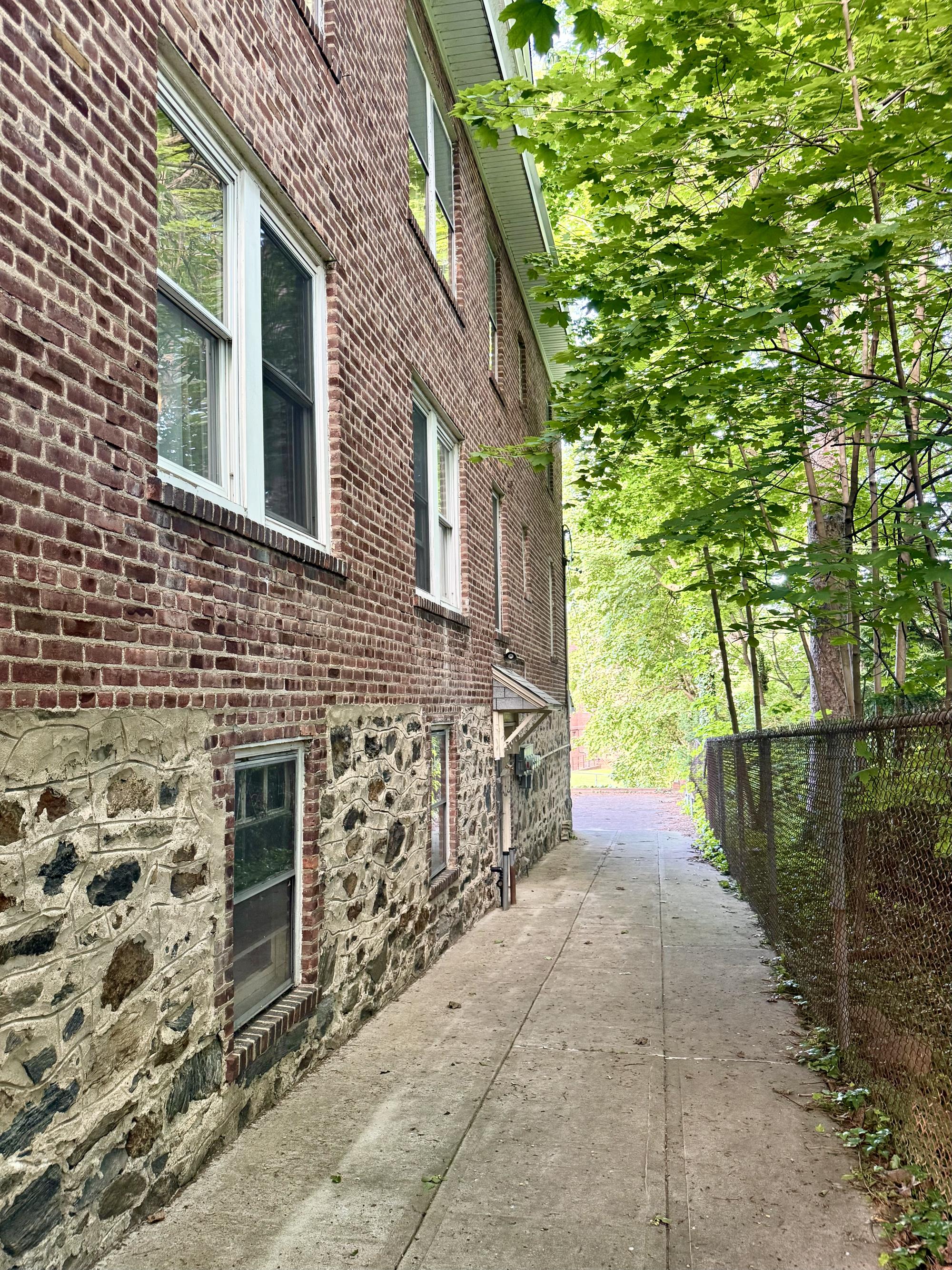 Three-Family Brick House with 2-Car Garage & Back Garden