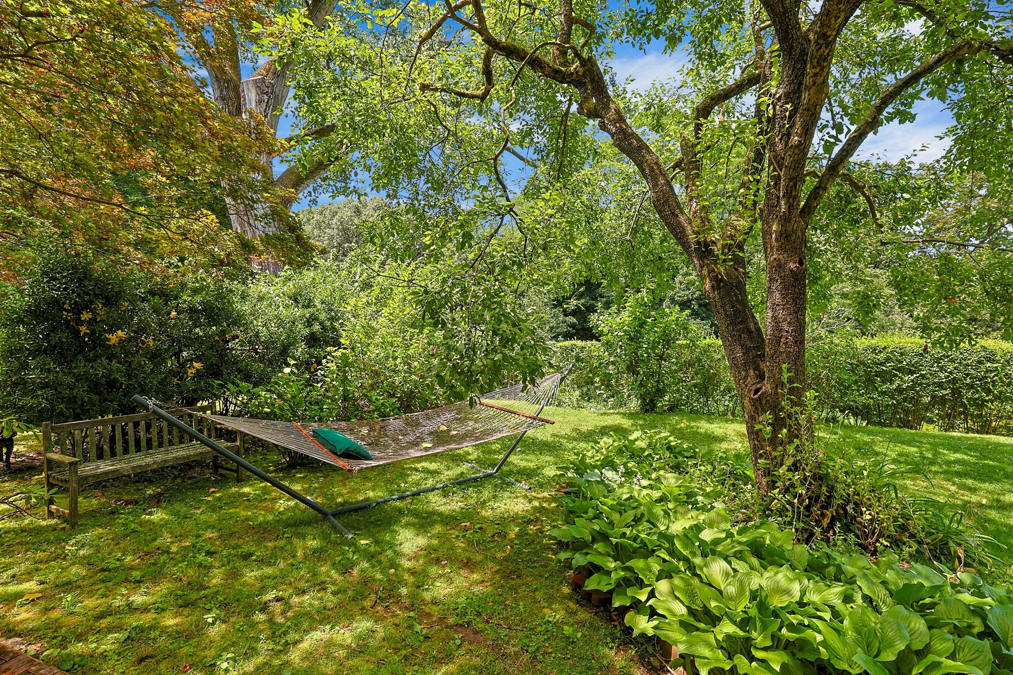 Spacious & Newly Renovated Triplex Townhouse with Luxe Condo Amenities, Seasonal Water Views, Deck, Garden & 2 Parking Spaces on Cul-de-Sac