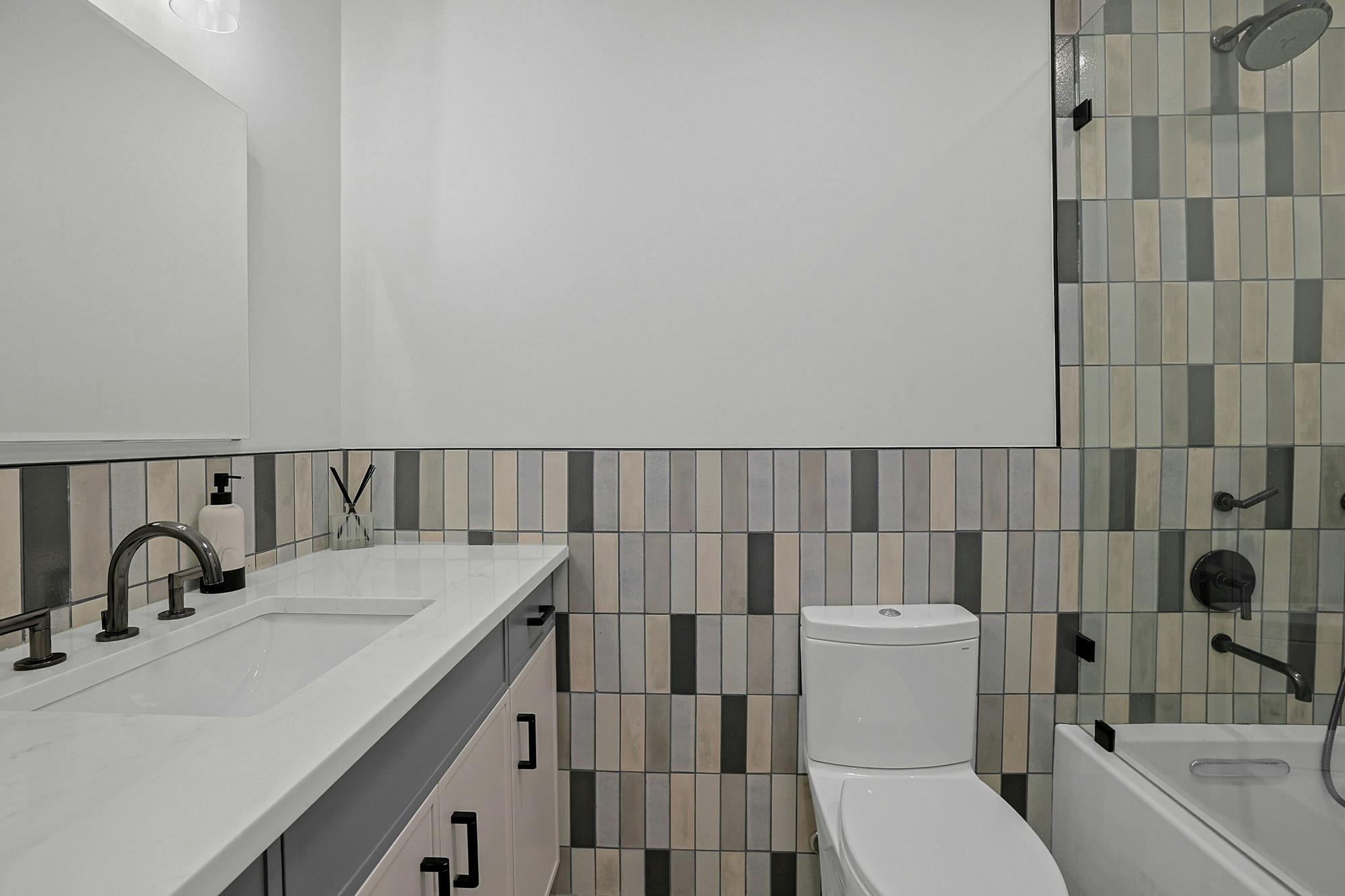 Spacious & Newly Renovated Triplex Townhouse with Luxe Condo Amenities, Seasonal Water Views, Deck, Garden & 2 Parking Spaces on Cul-de-Sac