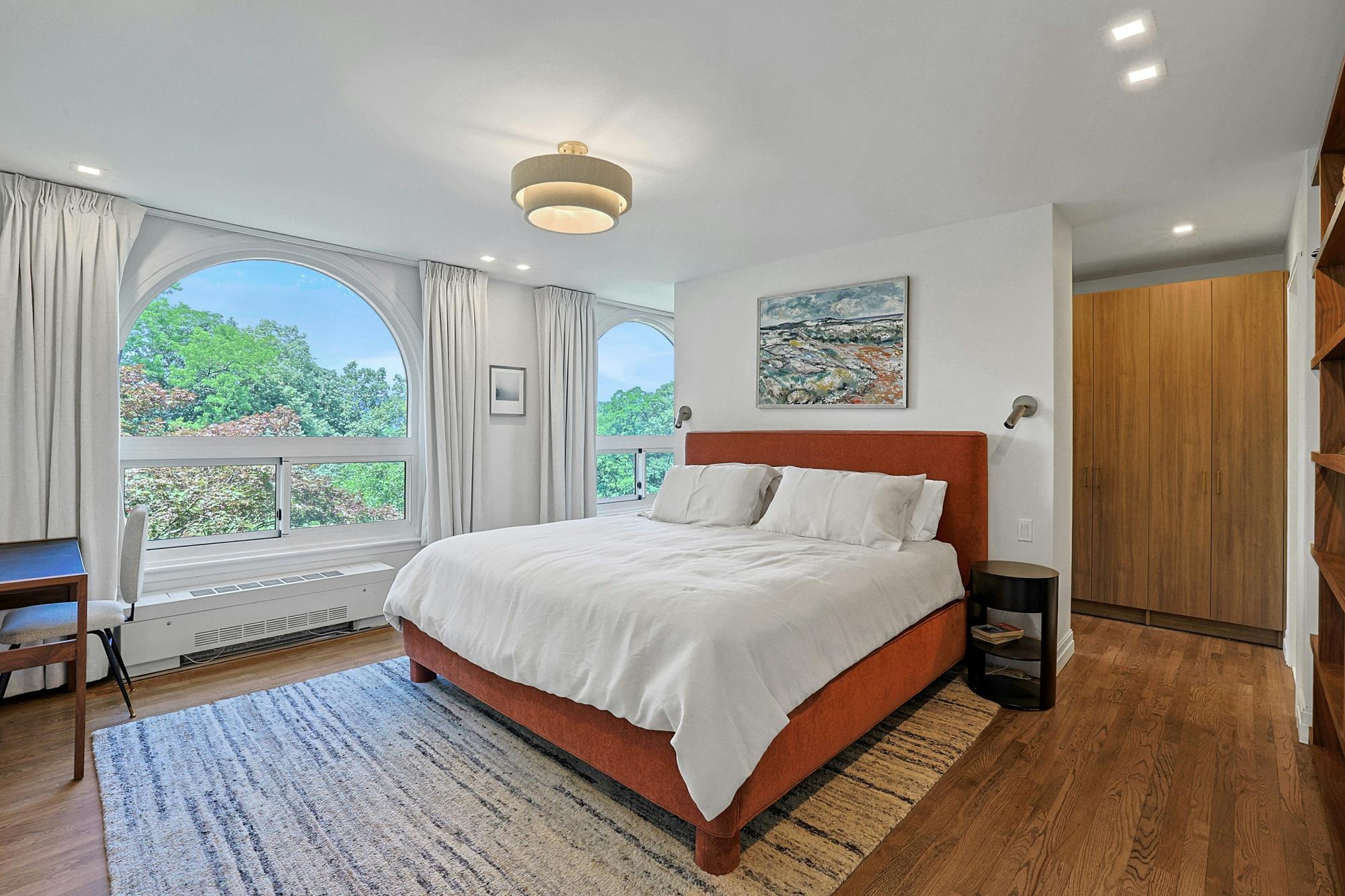 Spacious & Newly Renovated Triplex Townhouse with Luxe Condo Amenities, Seasonal Water Views, Deck, Garden & 2 Parking Spaces on Cul-de-Sac