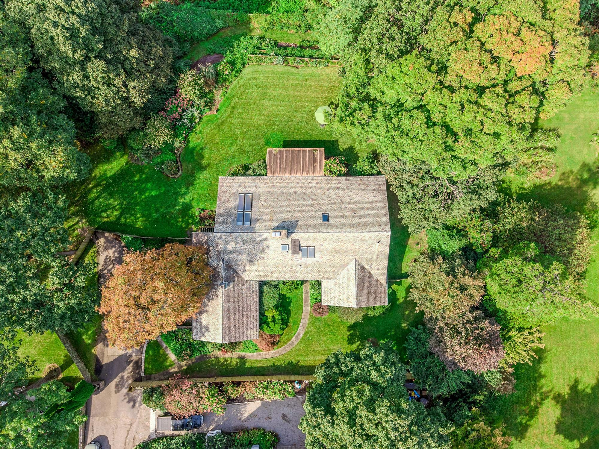 5-Bd. Contemporary-Style House on Three Quarters of an Acre with Patio, Pond & Grassy Grounds on a Secluded Cul-de-Sac