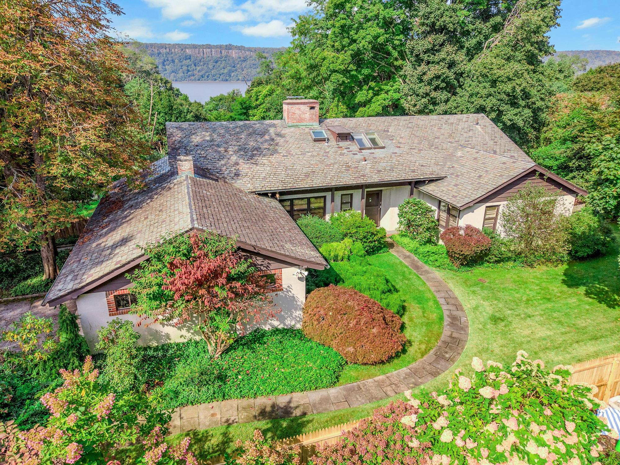 5-Bd. Contemporary-Style House on Three Quarters of an Acre with Patio, Pond & Grassy Grounds on a Secluded Cul-de-Sac