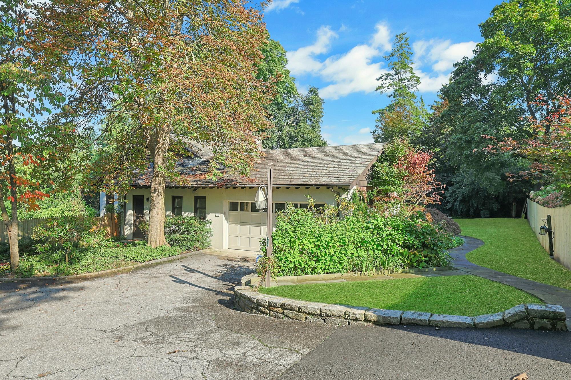 5-Bd. Contemporary-Style House on Three Quarters of an Acre with Patio, Pond & Grassy Grounds on a Secluded Cul-de-Sac