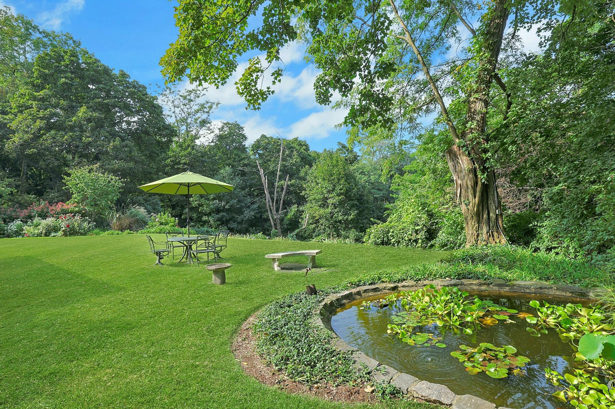 5-Bd. Contemporary-Style House on Three Quarters of an Acre with Patio, Pond & Grassy Grounds on a Secluded Cul-de-Sac