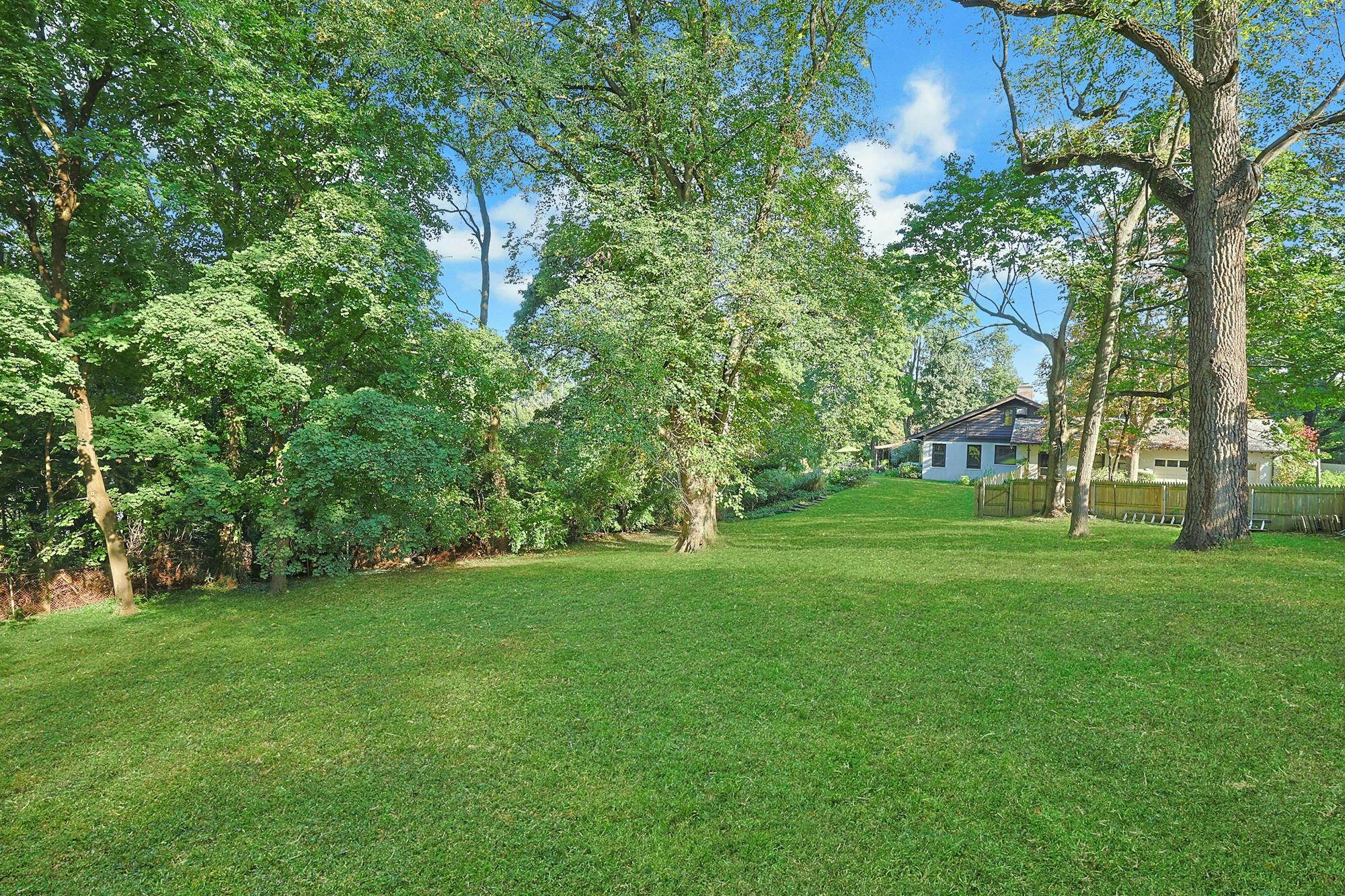 5-Bd. Contemporary-Style House on Three Quarters of an Acre with Patio, Pond & Grassy Grounds on a Secluded Cul-de-Sac