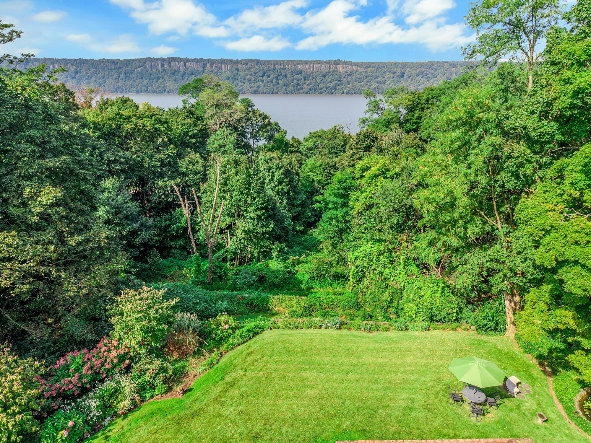 5-Bd. Contemporary-Style House on Three Quarters of an Acre with Patio, Pond & Grassy Grounds on a Secluded Cul-de-Sac