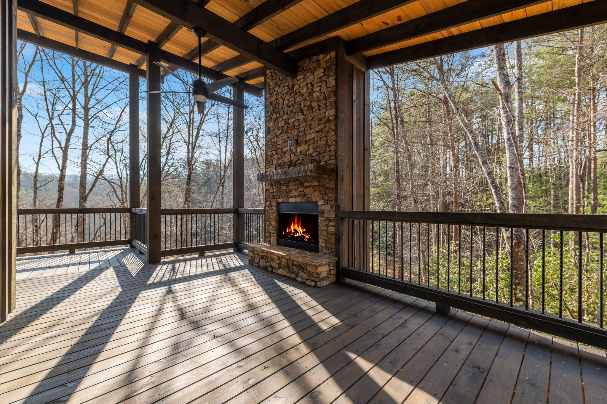 Custom mountain home designed into a wooded sloped lot in North Georgia