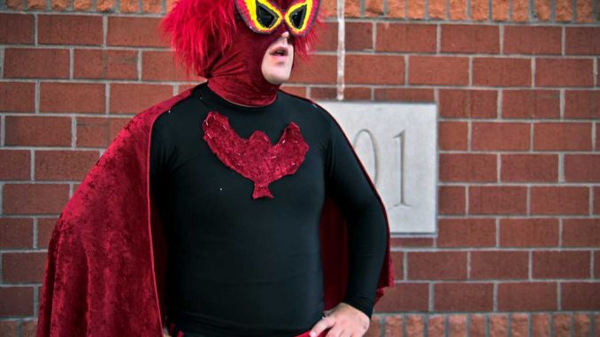 Trevor Flocco manipulates a Batman costume to make his own super hero. ( TIMOTHY VALSHTEIN / TTN ) Trevor Flocco manipulates a Batman costume to make his own super hero. ( TIMOTHY VALSHTEIN / TTN )