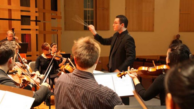 Adam Vidiksis conducts the Temple Composers Orchestra at a dress rehearsal for conTemplum’s show on Thursday, Nov. 1. | COURTESY CONTEMPLUM Adam Vidiksis conducts the Temple Composers Orchestra at a dress rehearsal for conTemplum’s show on Thursday, Nov. 1. | COURTESY CONTEMPLUM