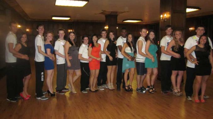 The men competing for “Deepher Dude” pose with Delta Phi Epsilon members. Deepher Dude raised money for cystic fibrosis research. | COURTESY COURTNEY BRADLEY The men competing for “Deepher Dude” pose with Delta Phi Epsilon members. Deepher Dude raised money for cystic fibrosis research. | COURTESY COURTNEY BRADLEY