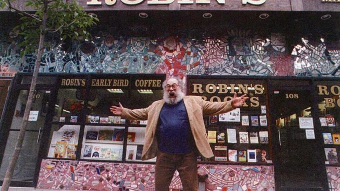 1970s-ROBINS-bookstore-web Larry Robin, owner of Robin’s Bookstore, stands outside his North 13th St. store in the ‘70s. | COURTESY GREG JONES