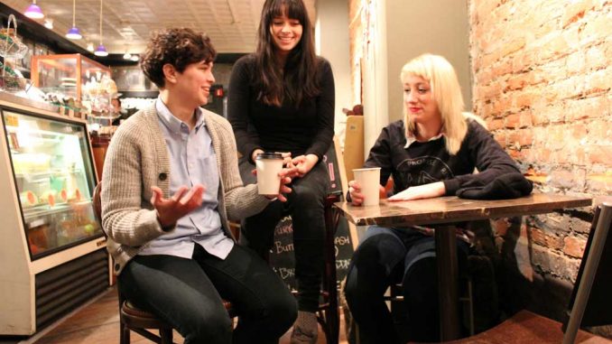 Cayetanahorizontal2-web (Left to right) Bassist Allegra Anka, drummer Kelly Olsen and singer-guitarist Augusta Koch sit in Milk & Honey Café on South Fourth Street. Cayetana self-released a demo in December 2012, which has been well-received by the DIY scene. | CARA STEFCHAK / TTN