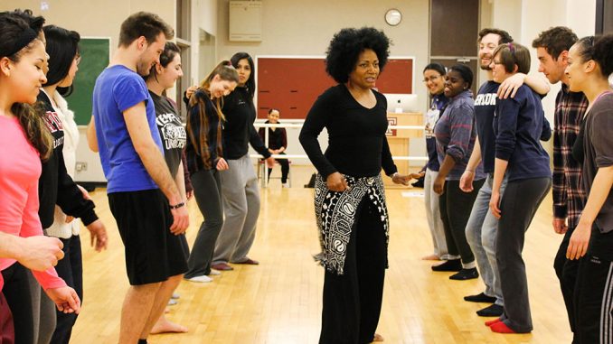 One day of class in the Embodying Pluralism course focused on teaching traditional African dance. Magira Ross (center), a guest lecturer, discussed the Middle Passage through dance. | Claire Sasko TTN One day of class in the Embodying Pluralism course focused on teaching traditional African dance. Magira Ross (center), a guest lecturer, discussed the Middle Passage through dance. | Claire Sasko TTN