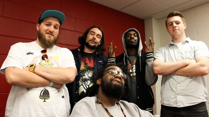 (From right) Rappers P64, Buggie Fresh, Prophet Lethal Dose and OHM (front) collaborate with the help of DJ Cody Griz (far left) to form the Hungry Ghosts.| Claire Sasko TTN (From right) Rappers P64, Buggie Fresh, Prophet Lethal Dose and OHM (front) collaborate with the help of DJ Cody Griz (far left) to form the Hungry Ghosts.| Claire Sasko TTN
