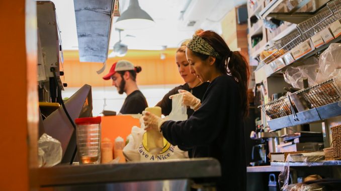 Manager Brandon Hopkins and employees Amy Shirk and Megan Chambers work at Fairmount restaurant, Rybread. Jenny Kerrigan |TTN Manager Brandon Hopkins and employees Amy Shirk and Megan Chambers work at Fairmount restaurant, Rybread. Jenny Kerrigan |TTN