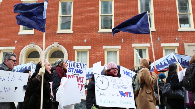 Adjunct professors chant, “Let us vote,” as they march down Liacouras Walk on Feb. 23. Pending a March 19 hearing with the Pennsylvania Labor Relations Board, adjuncts are demanding a vote for or against unionization. | Kara Milstein TTN Adjunct professors chant, “Let us vote,” as they march down Liacouras Walk on Feb. 23. Pending a March 19 hearing with the Pennsylvania Labor Relations Board, adjuncts are demanding a vote for or against unionization. | Kara Milstein TTN