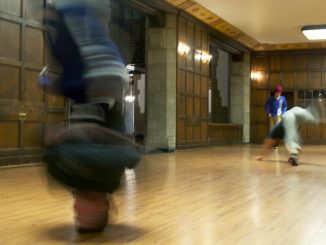 Dejan Majerle (left), headstands at Temple’s Bboy team’s practice in Mitten Hall. | Khanya Brann TTN