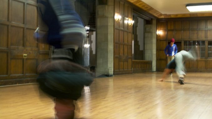 ProBreakingTour_section_10.13_khanyabrann_3 Dejan Majerle (left), headstands at Temple’s Bboy team’s practice in Mitten Hall. | Khanya Brann TTN