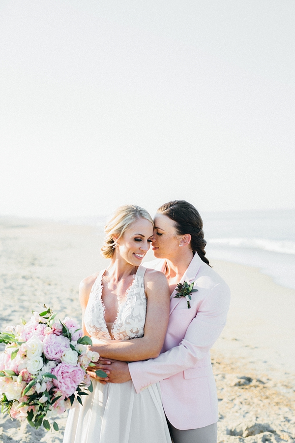 Bridal blazer and flowy bridal gown for lesbian wedding style ideas