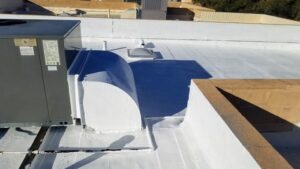 elastomeric roofing applied to a flat roof in Tucson