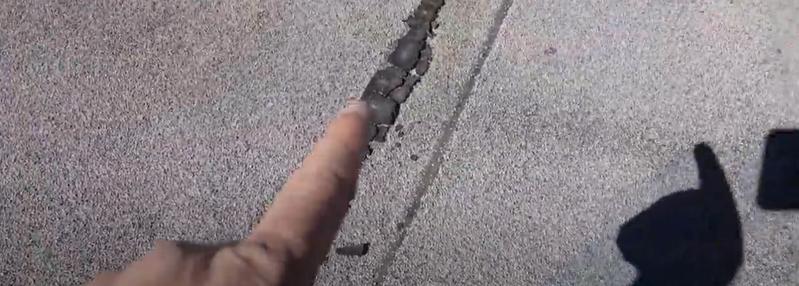 showing the need for commercial roof repair on a Tucson roof