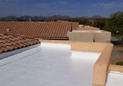 flat roof repair and coating on a Tucson house