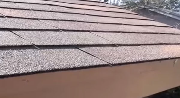 inspecting an asphalt shingle roof in Tucson