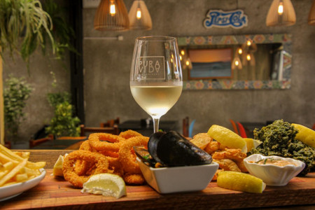 Pura Vida Restaurant in La Pedrera | Wood-Fired Pizza & Homemade Dishes