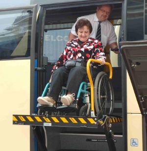 Motor coach with lift