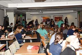 UCH employees fill a room in the Bruce Schroffel Conference Center before a presentation on human trafficking Dec. 7.