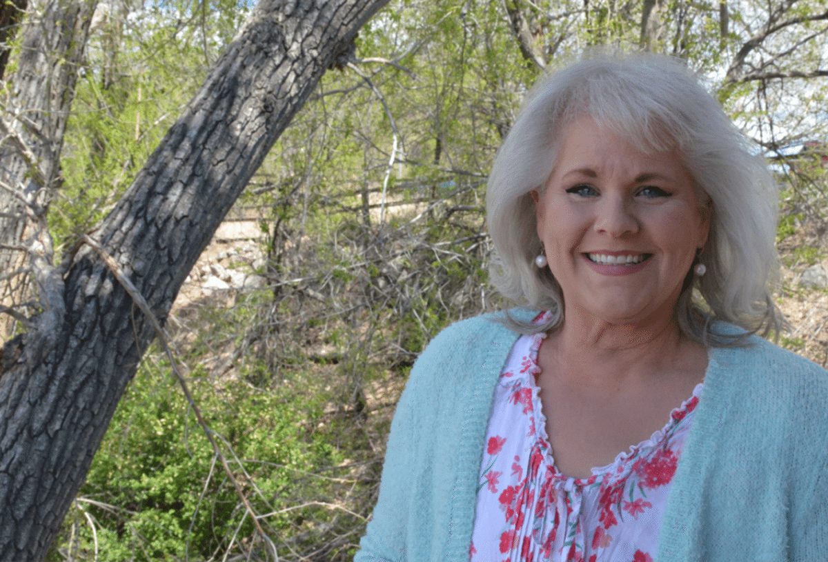 Jeannette Thurman poses outside. She was diagnosed with inflammatory breast cancer a few years ago and urgest women to get mammorgrams for Mother's Day.