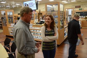 Dick Abramson, owner of the Centennial Gun Club, with Dr. Emmy Betz during a recent Ladies Night at the club