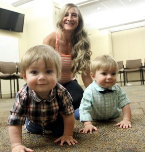 Tiffani Westbrook watches her boys, Judah and Josiah, play on the floor during a breastfeeding support group session at UCHealth Medical Center of the Rockies.
