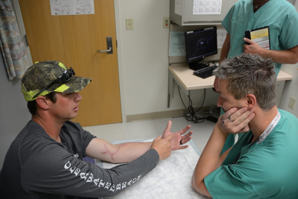 Daniel Bryce is shown during an appointment with his doctor, Dr. Ashley Ignatiuk, at University of Colorado Hospital.