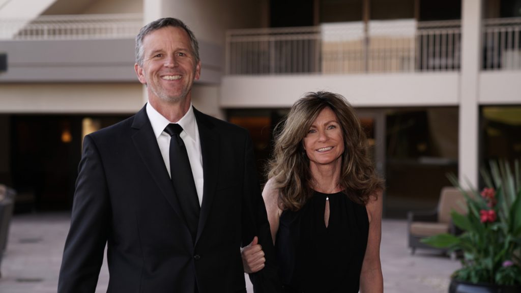 Don Soltis attends a work event with his wife, Kris.