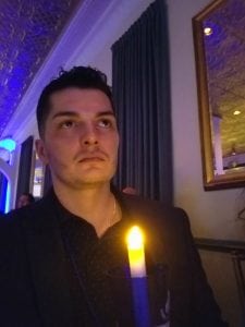 Stephen Estrada at a candlelight vigil in honor of patients lost to colon cancer. Photo courtesy of Stephen Estrada-Erskine.