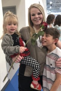 Deveyn Brinkerhoff poses with her niece and nephew.