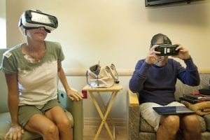patient and husband using virtual reality in health care