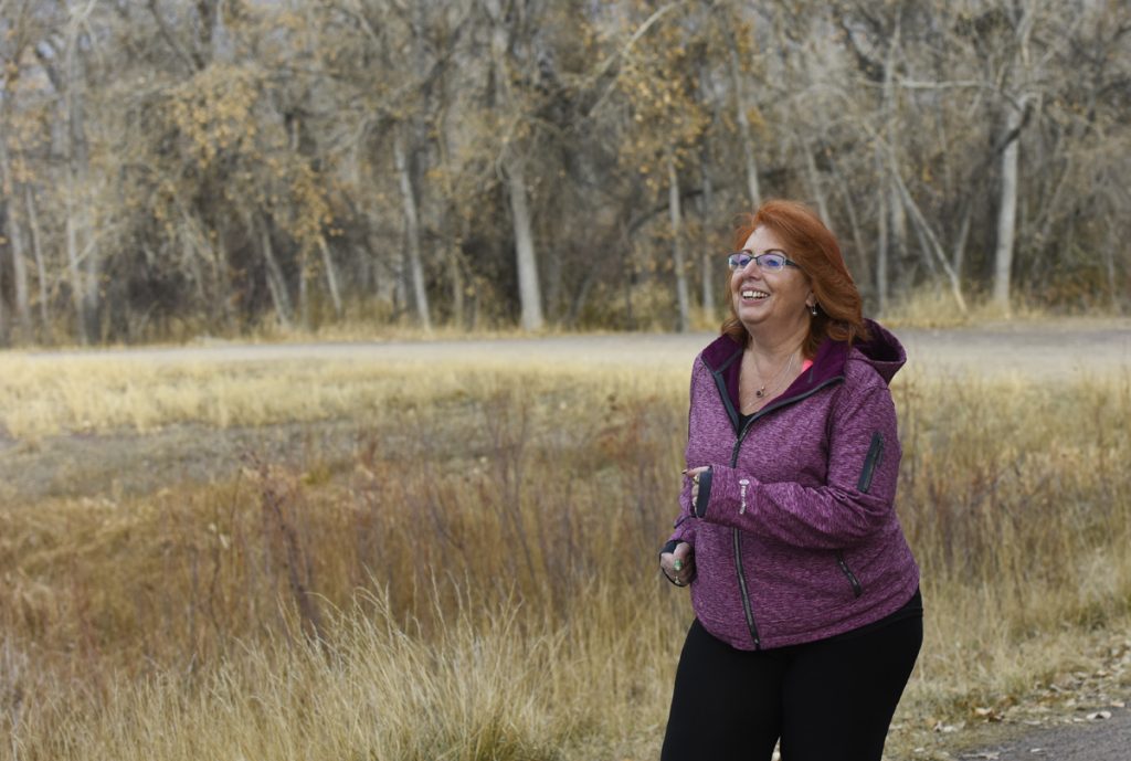 A woman running in a park.