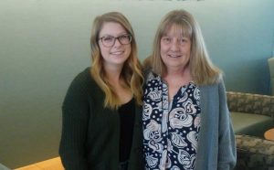 A photo of a mom and daughter together. The mom has survived an abdominal cancer ordeal, while the daughter is in college and interested in a medical career.