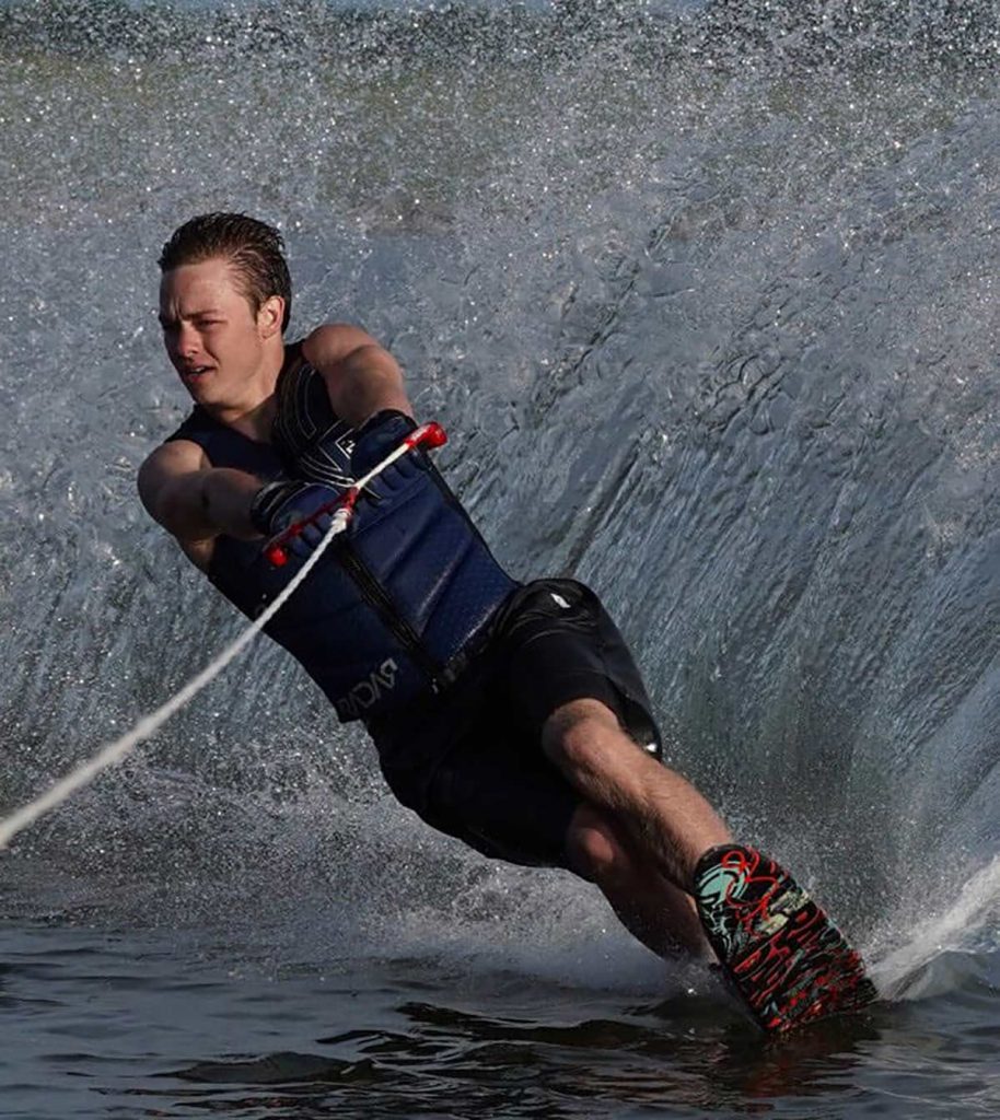 a young man water skiing