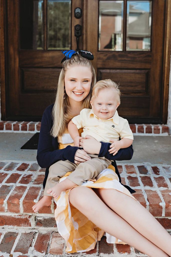 Depsite heart problems, Hudson is doing well. Here he poses with his sister, Henley.