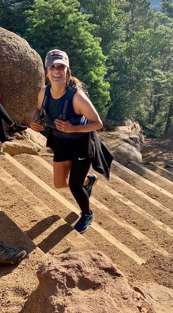 women running up stairs with leg wrap that helps her with her lymphedema after cancer