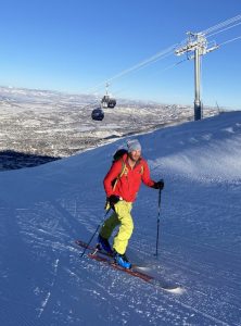 In this photo, a skier "skins" up the mountain on specialized equipment.